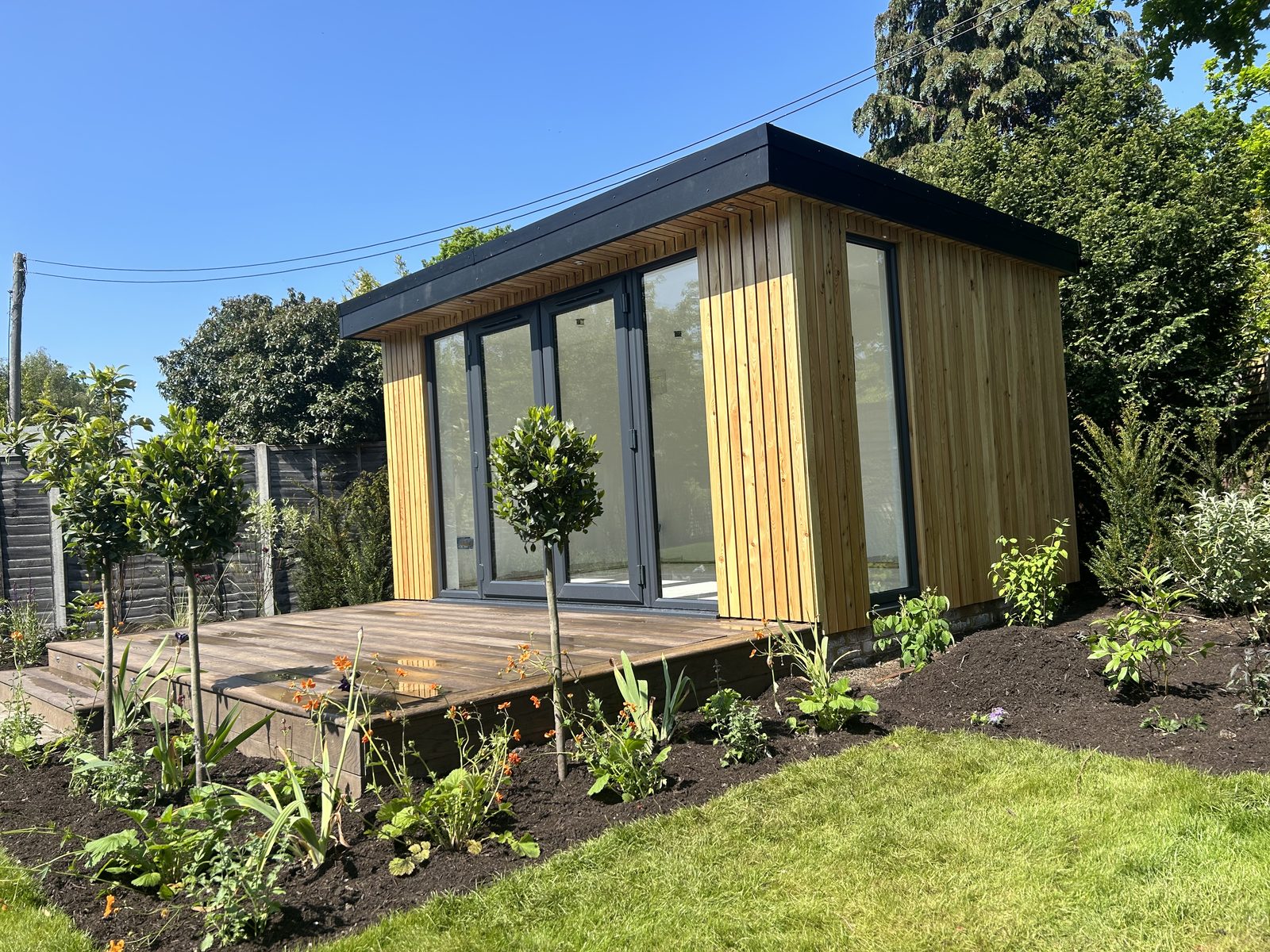 One of our garden rooms, with a deck and new planting