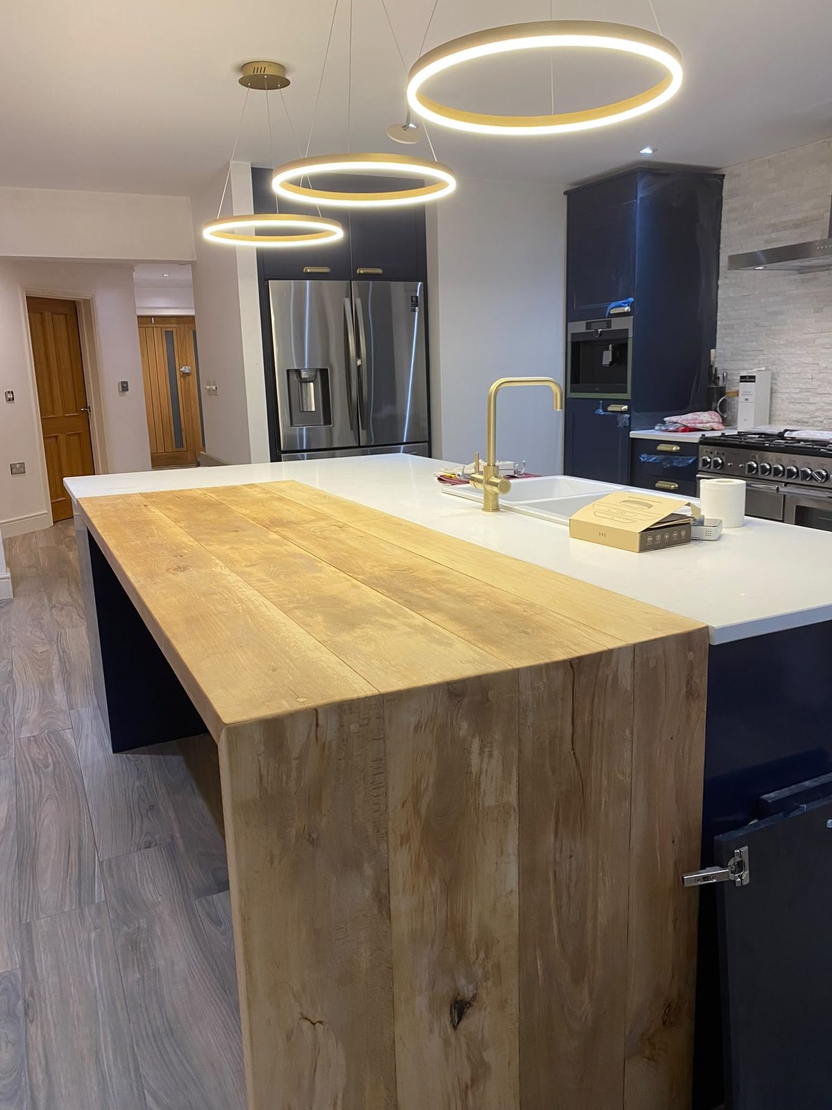 Kitchen with oak waterfall island