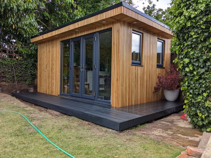 Cedar garden office with composite deck
