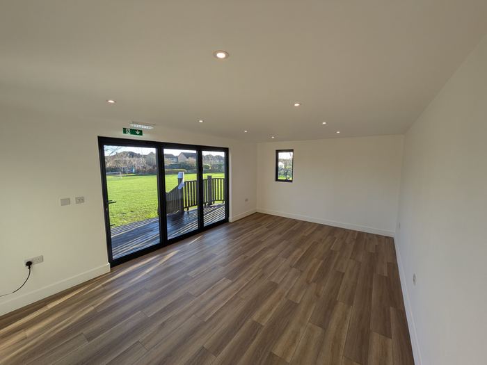 Garden room with bi-folds onto the deck