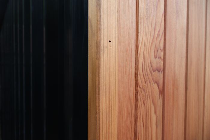 Where the timber meets the darker cladding