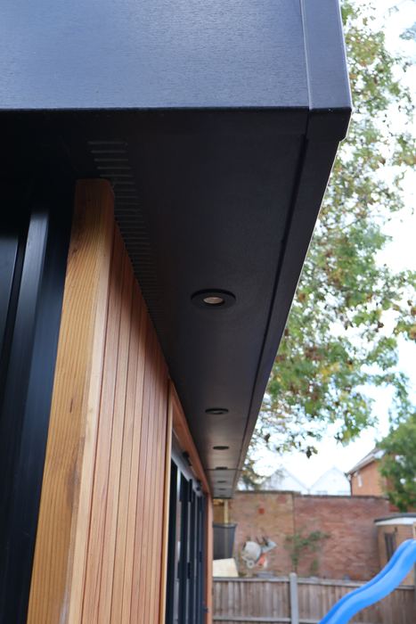 A downlight in the deep soffit