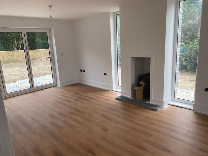 Living room with bi-folds and fireplace