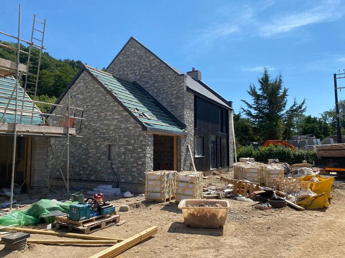 Stone-clad new build under construction